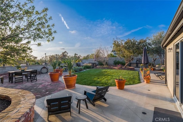 view of patio / terrace featuring a fenced backyard and outdoor dining space