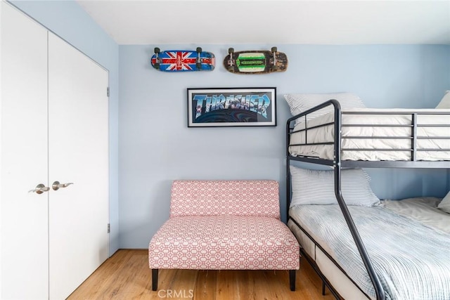 bedroom with light wood-style floors