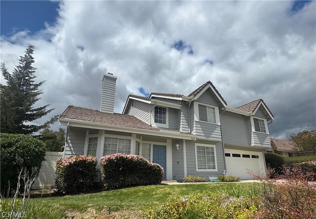 41880 Humber Dr, Temecula, CA 92591 - view of front of home with a chimney, fence, and a garage
