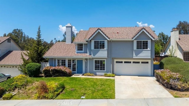 41880 Humber Dr, Temecula, CA 92591 - traditional home with a tiled roof, a garage, concrete driveway, and a chimney