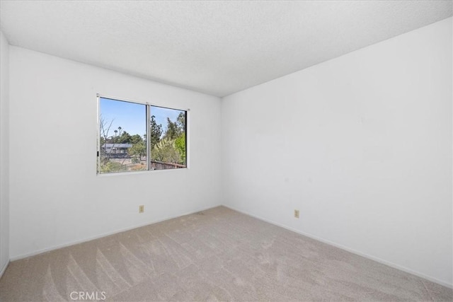 41880 Humber Dr, Temecula, CA 92591 - carpeted empty room featuring a textured ceiling and baseboards