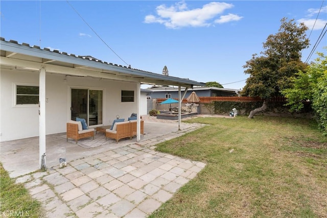 view of yard featuring an outdoor hangout area, a patio area, and a fenced backyard