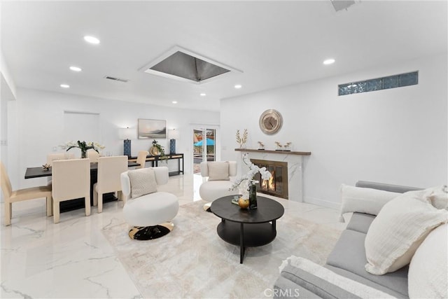 living room with marble finish floor, visible vents, a fireplace, and recessed lighting