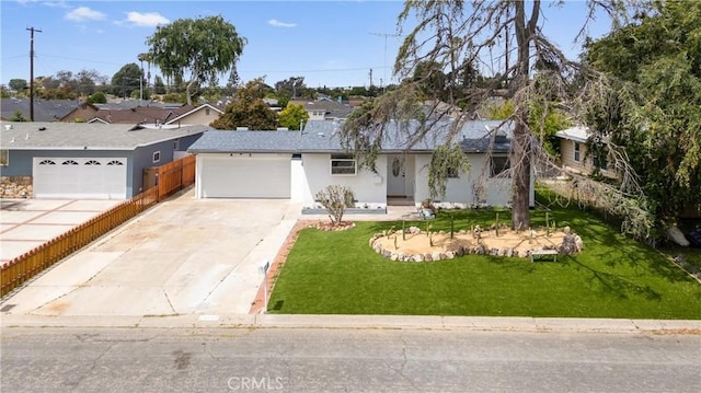 ranch-style home featuring driveway, stucco siding, a residential view, and a front lawn