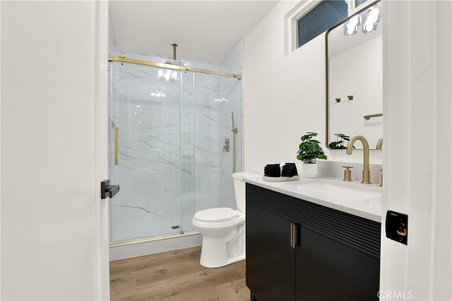29282 Sonoma Way, San Juan Capistrano, CA 92675 - full bathroom featuring vanity, a marble finish shower, wood finished floors, and toilet