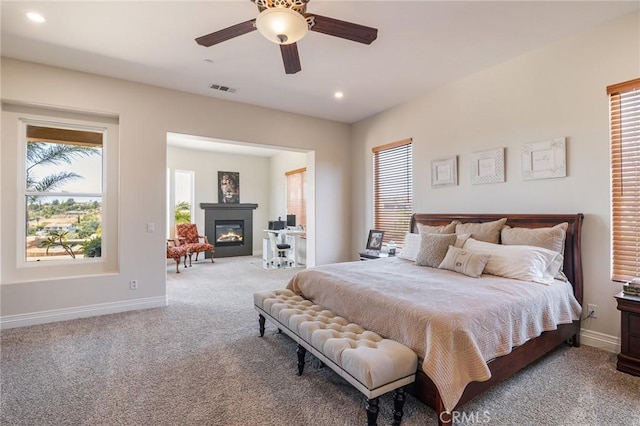 3863 Flowerwood Ln, Fallbrook, CA 92028 - carpeted bedroom featuring recessed lighting, a glass covered fireplace, and a ceiling fan