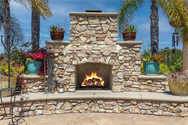 3863 Flowerwood Ln, Fallbrook, CA 92028 - view of patio featuring an outdoor stone fireplace