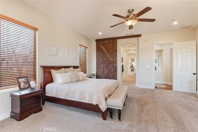 3863 Flowerwood Ln, Fallbrook, CA 92028 - bedroom featuring arched walkways, light carpet, baseboards, recessed lighting, and ensuite bathroom