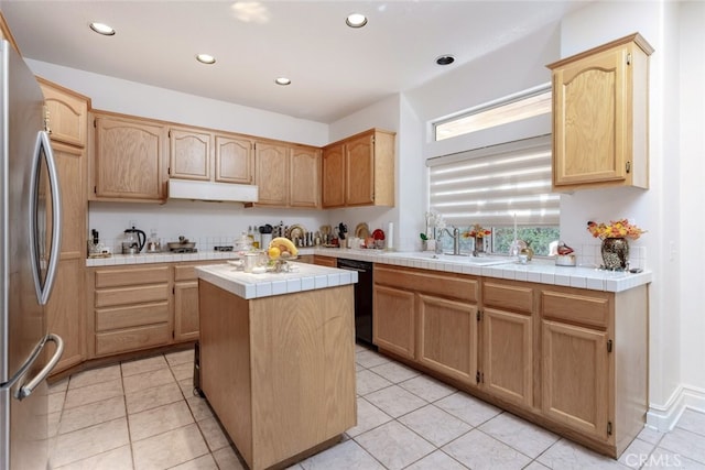 kitchen with a sink, dishwasher, freestanding refrigerator, recessed lighting, and under cabinet range hood