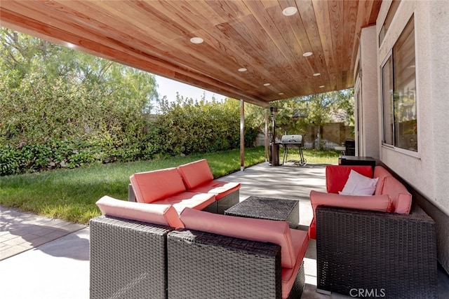 view of patio with an outdoor hangout area and a fenced backyard