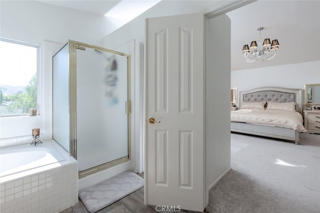 full bathroom featuring an inviting chandelier, connected bathroom, a bath, and a shower stall