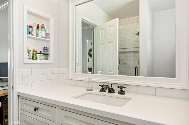 bathroom featuring vanity and a stall shower