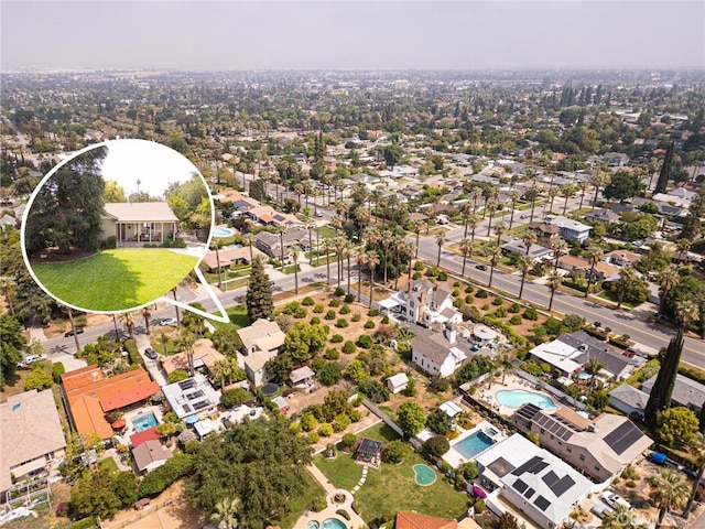 drone / aerial view with a residential view