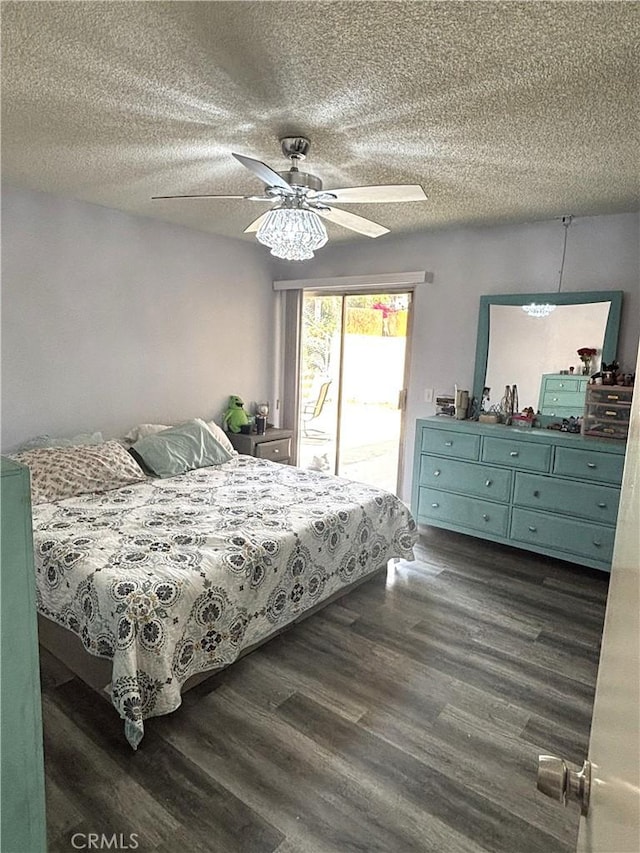 6845 Butte Dr, Riverside, CA 92505 - bedroom with access to exterior, a textured ceiling, dark wood-style flooring, and ceiling fan