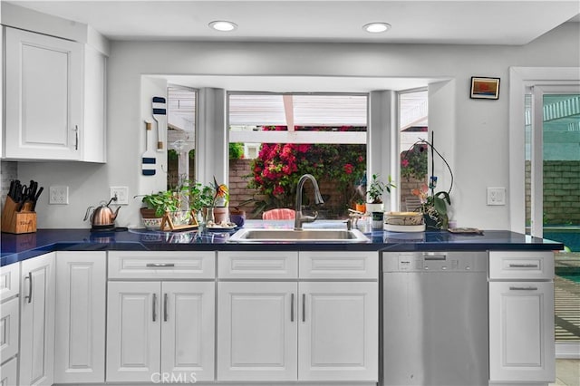 interior space featuring recessed lighting, plenty of natural light, a sink, and dishwasher