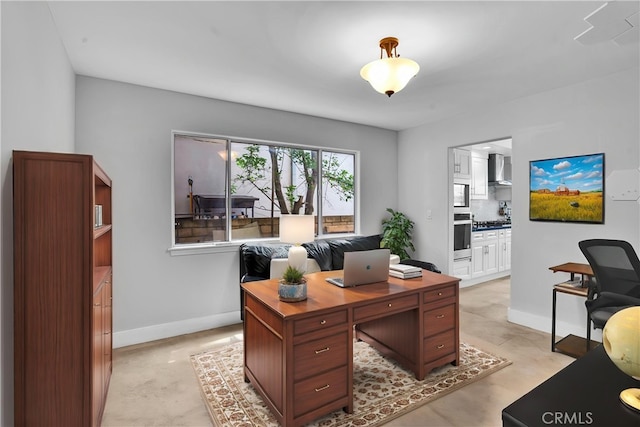 office area featuring baseboards