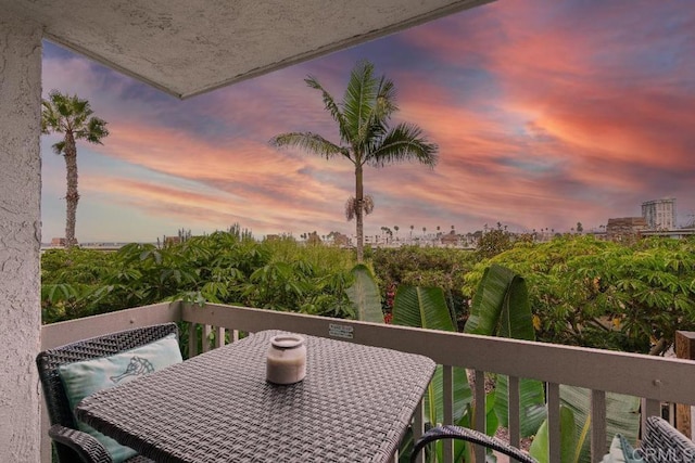 balcony with outdoor dining area