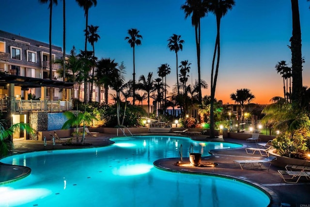 community pool with a patio area