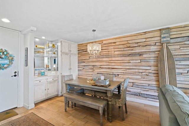dining area with recessed lighting, a chandelier, and light wood-type flooring