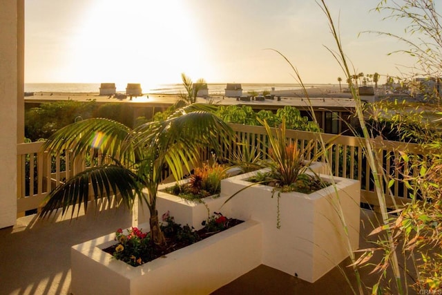 patio terrace at dusk with a balcony