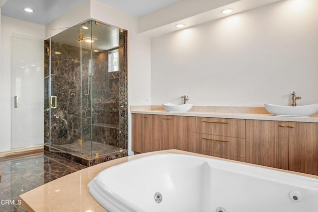 bathroom featuring recessed lighting, a tub with jets, and a stall shower