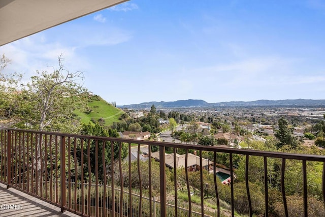balcony featuring a mountain view