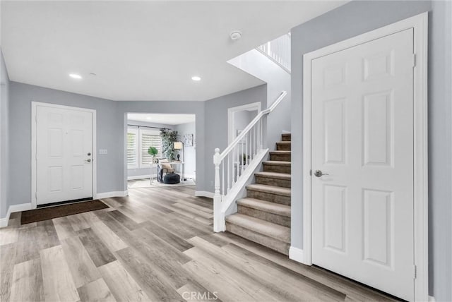 20372 Crooked Branch St, Riverside, CA 92507 - entryway with stairway, baseboards, wood finished floors, and recessed lighting