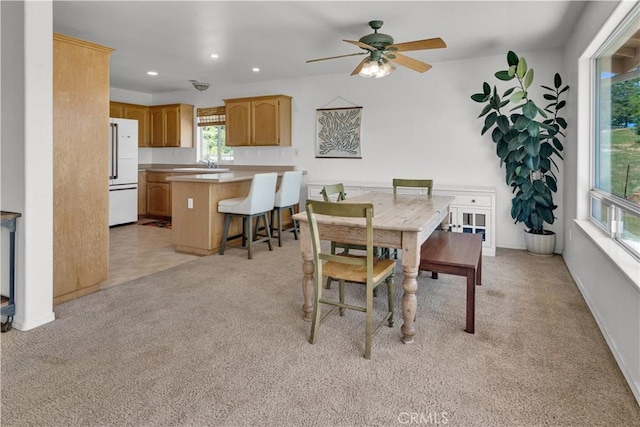 9121 San Diego Rd, Atascadero, CA 93422 - dining room with light carpet, a ceiling fan, and recessed lighting