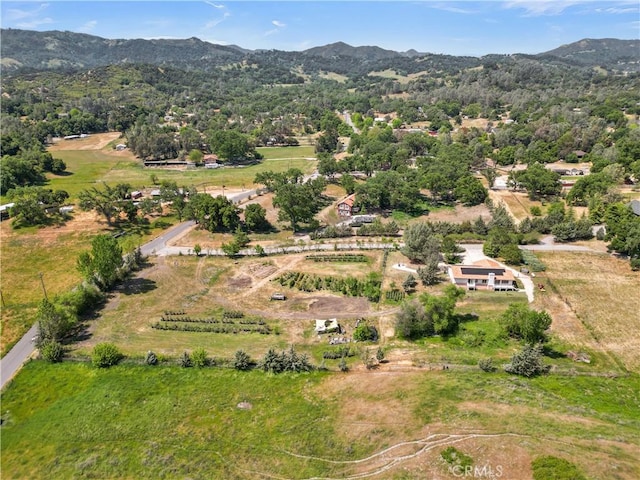 bird's eye view with a mountain view