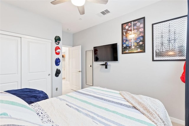 bedroom featuring a closet and a ceiling fan