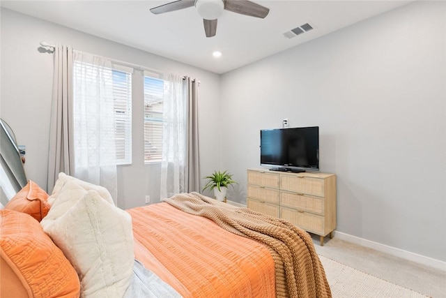 bedroom with light carpet, baseboards, a ceiling fan, and recessed lighting