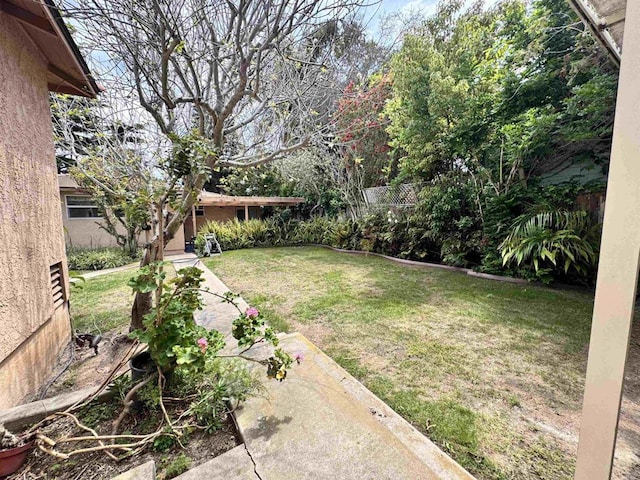 view of yard featuring fence