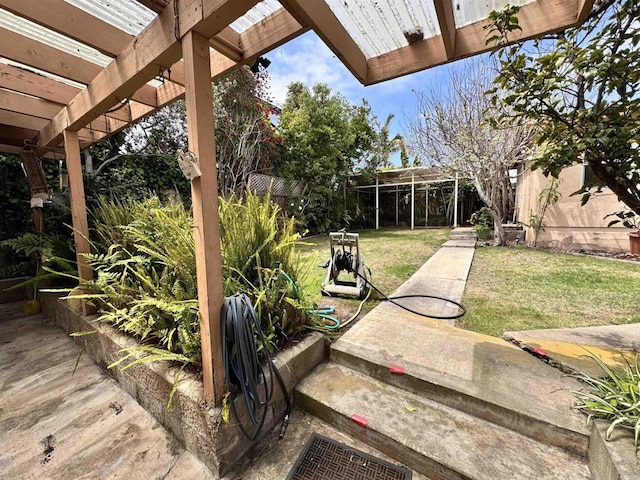 view of yard featuring a pergola and fence private yard