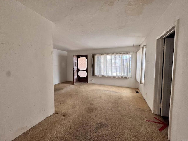 1020 Archer St, San Diego, CA 92109 - carpeted spare room with a textured ceiling