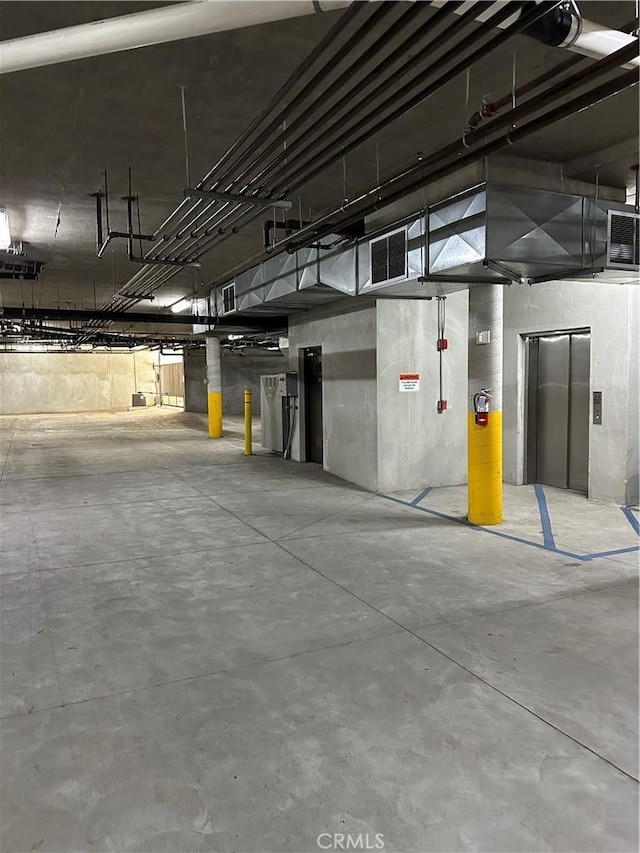 600 Morro Bay Blvd Unit 302, Morro Bay, CA 93442 - parking garage featuring visible vents and elevator