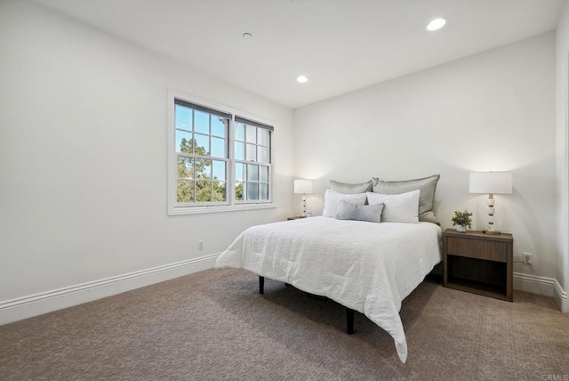 carpeted bedroom with baseboards and recessed lighting
