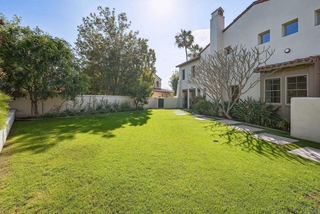 view of yard featuring fence