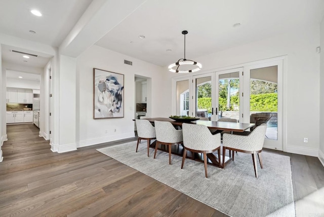 dining room featuring visible vents, baseboards, recessed lighting, dark wood-type flooring, and french doors