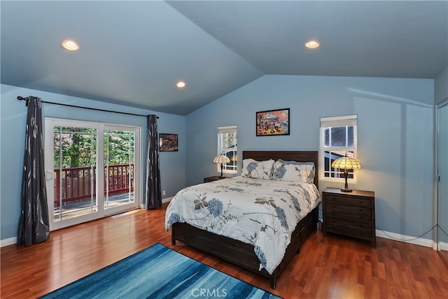 bedroom with baseboards, access to outside, wood finished floors, and lofted ceiling