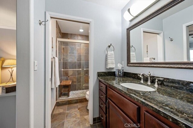 1585 Saratoga Ave, Grover Beach, CA 93433 - full bath featuring a shower stall, toilet, vanity, and tile patterned flooring