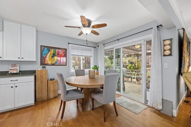 1585 Saratoga Ave, Grover Beach, CA 93433 - dining space with light wood finished floors, ceiling fan, and baseboards