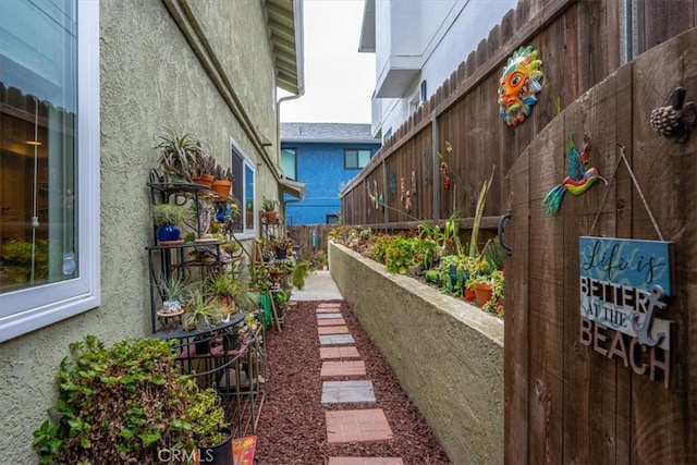 1585 Saratoga Ave, Grover Beach, CA 93433 - view of home's exterior featuring stucco siding and fence
