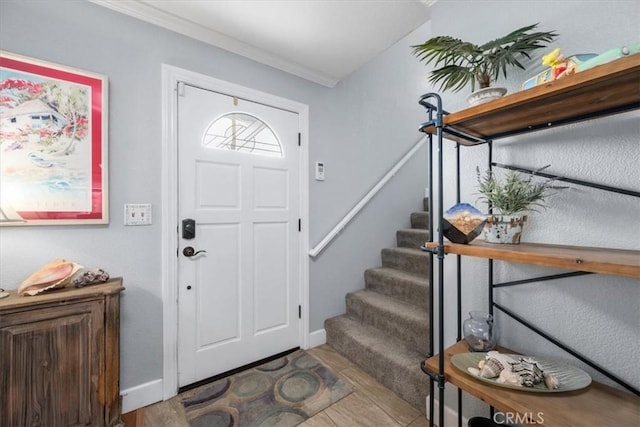 1585 Saratoga Ave, Grover Beach, CA 93433 - entrance foyer featuring stairway, crown molding, wood finished floors, and baseboards