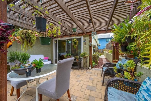 1585 Saratoga Ave, Grover Beach, CA 93433 - view of patio / terrace with outdoor dining space, a pergola, and fence