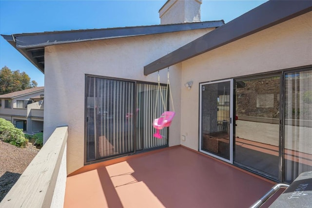 view of patio / terrace with a balcony