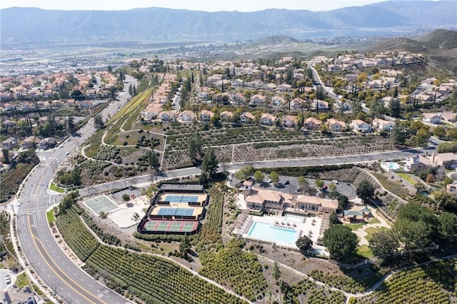 drone / aerial view featuring a mountain view