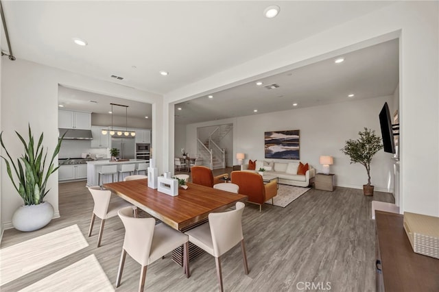 1776 Canyon Oaks Ln, Lake Forest, CA 92610 - dining room featuring light wood finished floors, recessed lighting, stairway, and baseboards