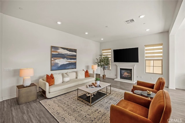 1776 Canyon Oaks Ln, Lake Forest, CA 92610 - living room featuring wood finished floors, baseboards, a glass covered fireplace, and recessed lighting