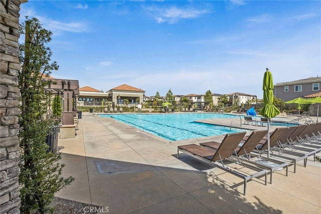 1776 Canyon Oaks Ln, Lake Forest, CA 92610 - community pool with a patio area and a pergola