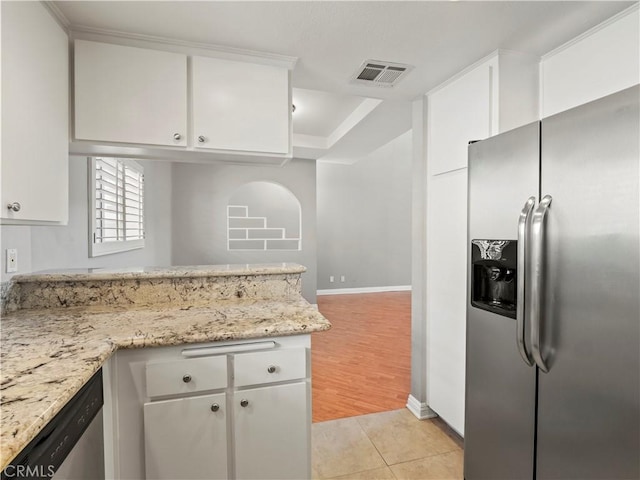 4301 Fulton Ave Unit 303, Sherman Oaks, CA 91423 - kitchen with appliances with stainless steel finishes, white cabinetry, and baseboards